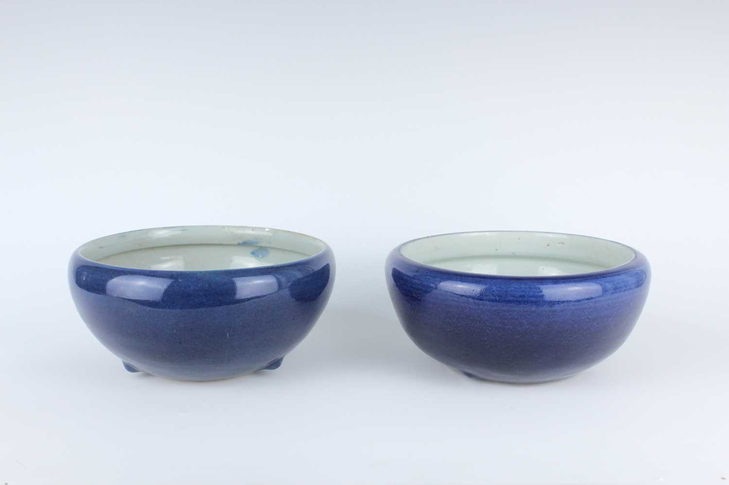 Lot 75 - A pair of Chinese blue-glazed porcelain...