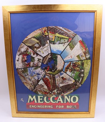Lot 1808 - Meccano Magazine framed round jigsaw,...