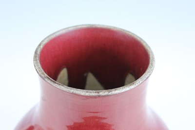 Lot 89 - A Chinese copper-red glazed baluster vase,...