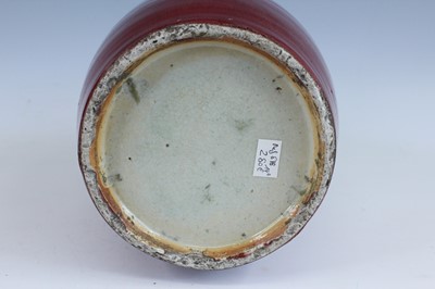 Lot 89 - A Chinese copper-red glazed baluster vase,...