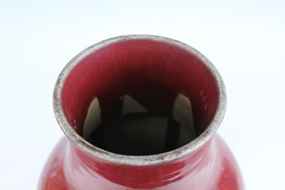 Lot 89 - A Chinese copper-red glazed baluster vase,...