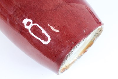 Lot 89 - A Chinese copper-red glazed baluster vase,...