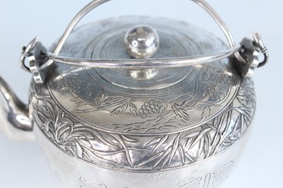 Lot 59 - A Chinese silver export twin-handled teapot,...