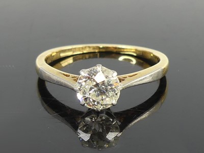 Lot 2696 - A yellow and white metal diamond solitaire...