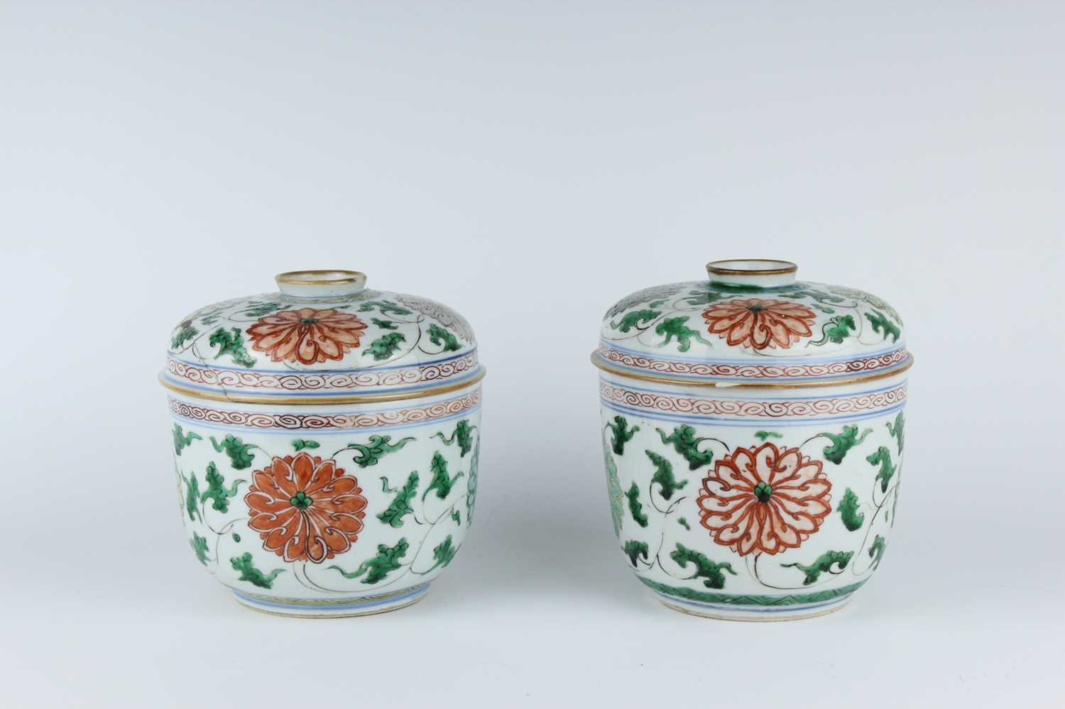 Lot 182 - A near pair of Chinese famille verte jars and...