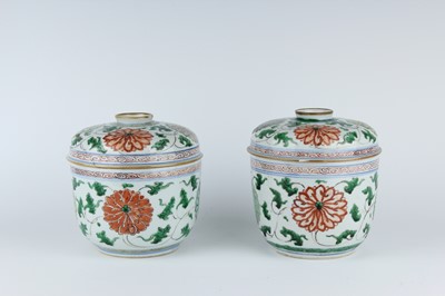 Lot 182 - A near pair of Chinese famille verte jars and...
