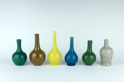 Lot 79 - A group of six Chinese monochrome bottle vases,...