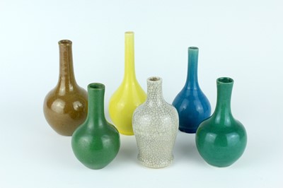 Lot 79 - A group of six Chinese monochrome bottle vases,...