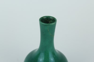 Lot 79 - A group of six Chinese monochrome bottle vases,...