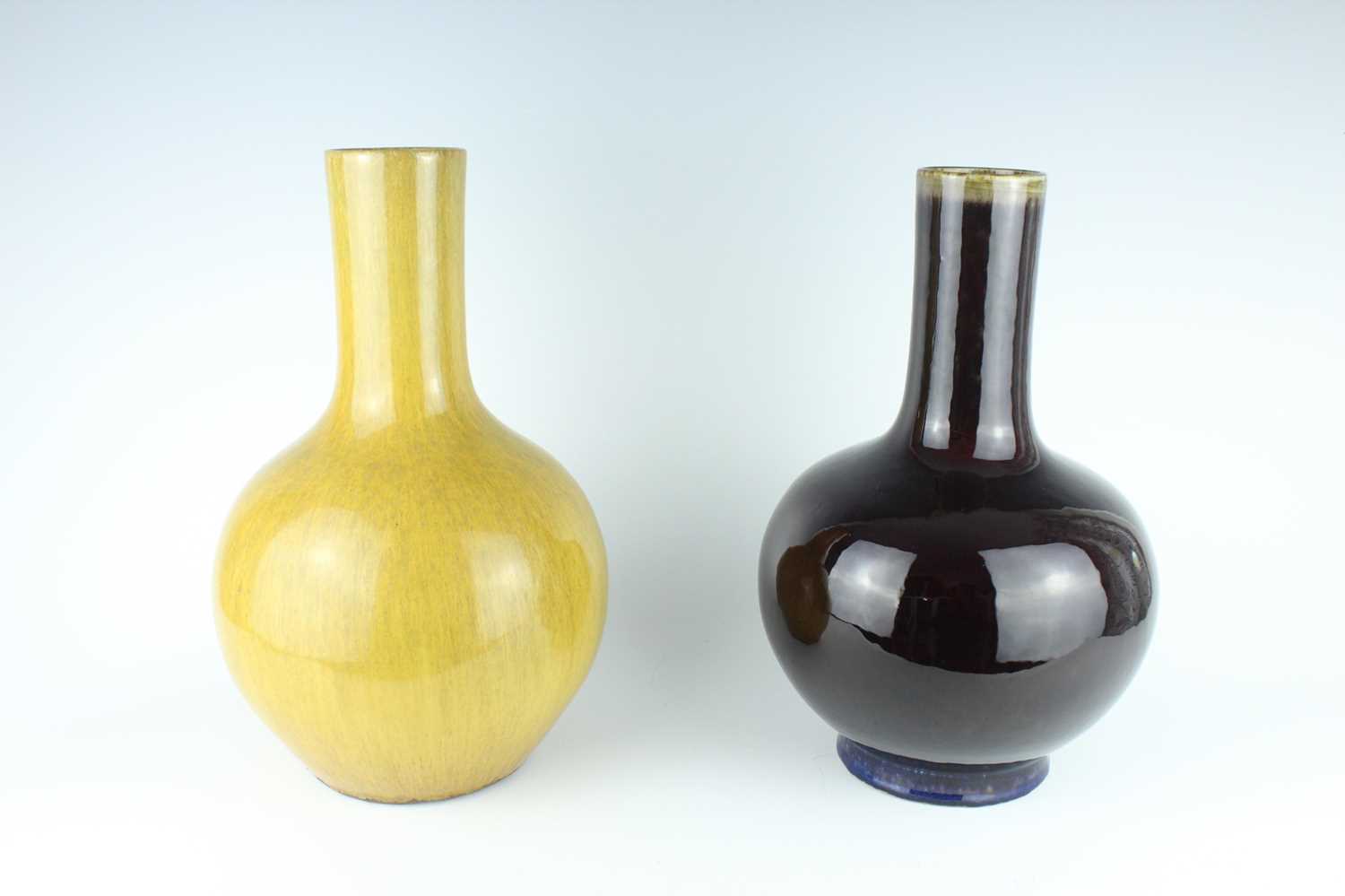 Lot 82 - Two large Chinese monochrome bottle vases,...