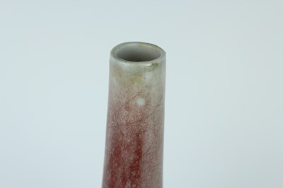 Lot 86 - A Chinese peach-bloom-glazed bottle vase, Qing...