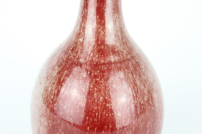 Lot 86 - A Chinese peach-bloom-glazed bottle vase, Qing...