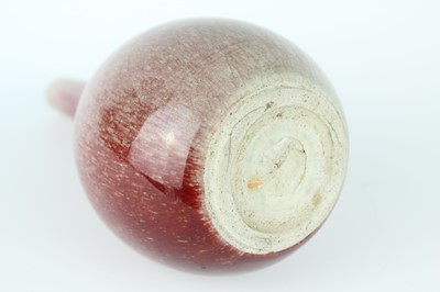 Lot 86 - A Chinese peach-bloom-glazed bottle vase, Qing...