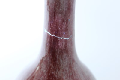 Lot 86 - A Chinese peach-bloom-glazed bottle vase, Qing...