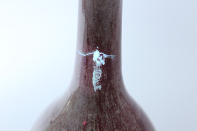 Lot 86 - A Chinese peach-bloom-glazed bottle vase, Qing...