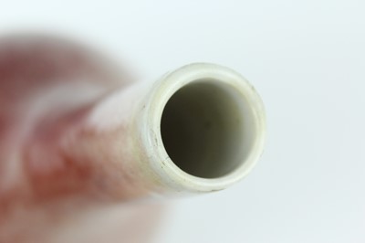 Lot 86 - A Chinese peach-bloom-glazed bottle vase, Qing...