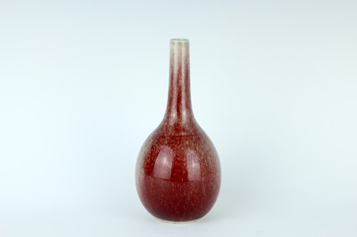 Lot 86 - A Chinese peach-bloom-glazed bottle vase, Qing...