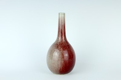 Lot 86 - A Chinese peach-bloom-glazed bottle vase, Qing...