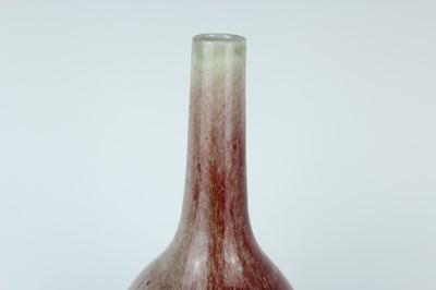 Lot 86 - A Chinese peach-bloom-glazed bottle vase, Qing...