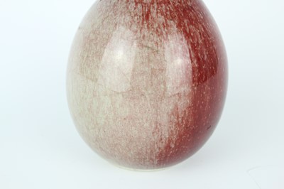Lot 86 - A Chinese peach-bloom-glazed bottle vase, Qing...