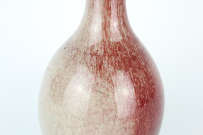 Lot 86 - A Chinese peach-bloom-glazed bottle vase, Qing...