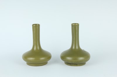 Lot 80 - A pair of Chinese teadust-glazed bottle vases,...