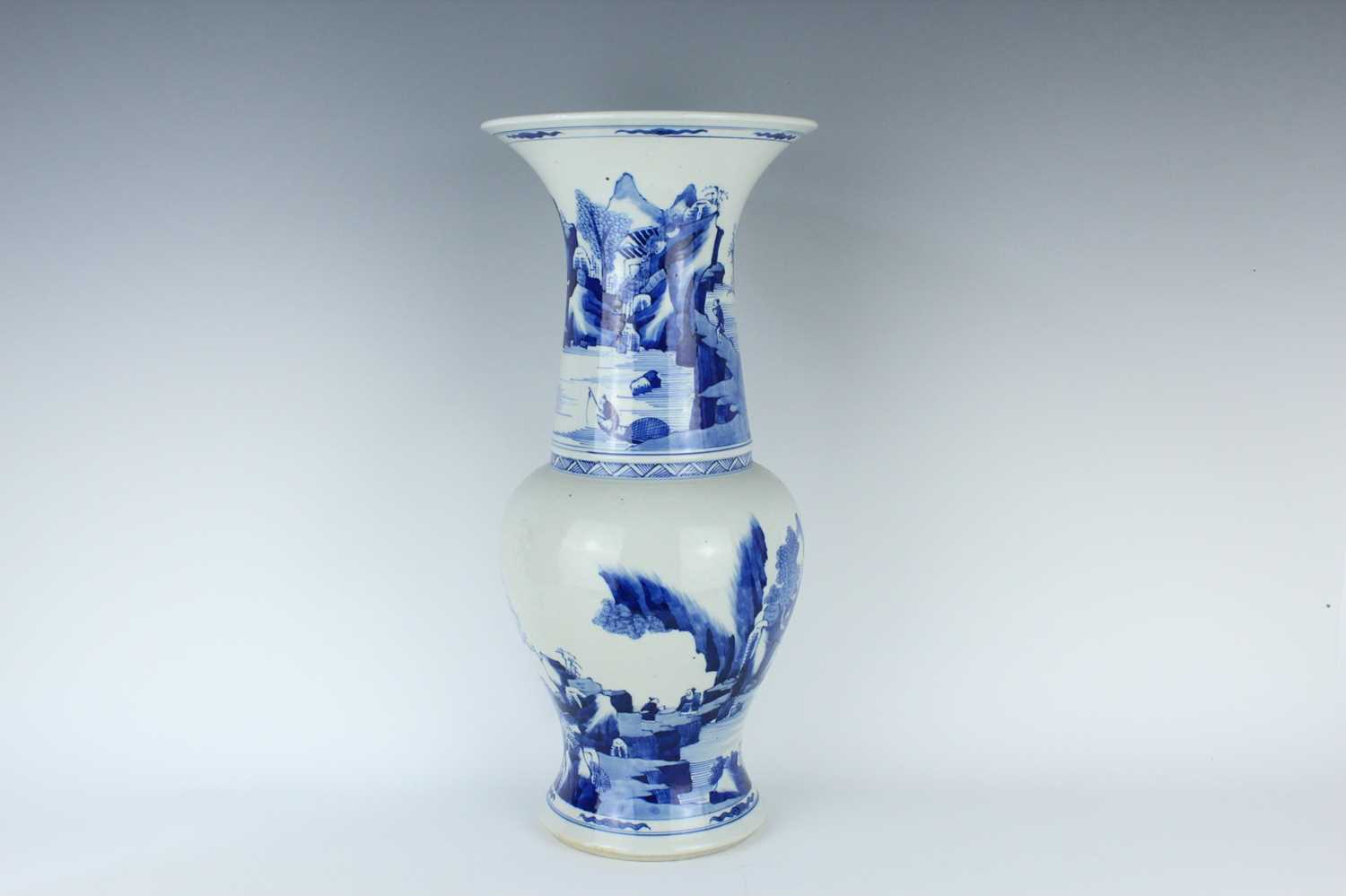 Lot 13 - A large Chinese blue and white ‘landscape’ yen...