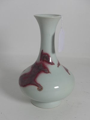 Lot 6 - A Chinese copper-red decorated yuhuchun vase,...