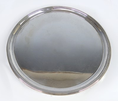 Lot 2228 - A George III silver card waiter, of circular...