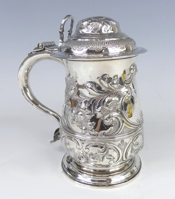 Lot 2157 - A George II silver lidded tankard, with...
