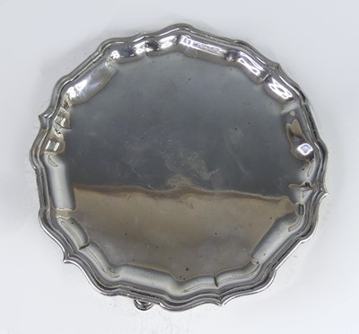 Lot 2224 - A George II silver footed card waiter, maker...