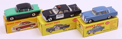 Lot 1322 - A collection of three boxed Dinky Toy cars to...