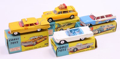 Lot 1432 - A collection of four various boxed Corgi Toy...