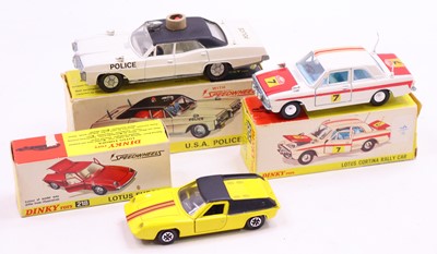 Lot 1286 - A collection of three various boxed Dinky Toy...