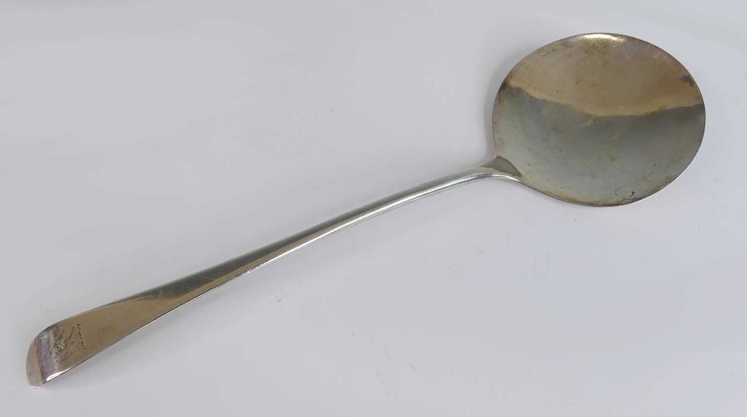Lot 2094 - A large George III silver serving spoon,...