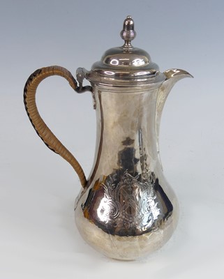 Lot 2124 - A George II silver coffee pot, having engraved...