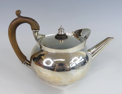 Lot 2247 - A George III silver teapot, of rounded form...
