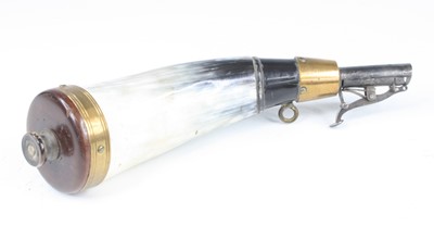 Lot 917 - A late 19th century horn shot flask, the base...