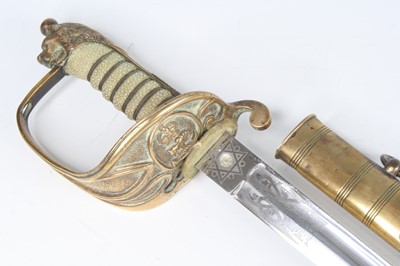 Lot 681 - A British Royal Naval Reserve dress sword, the...