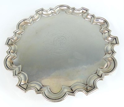 Lot 2225 - A George II silver card waiter, having pie...