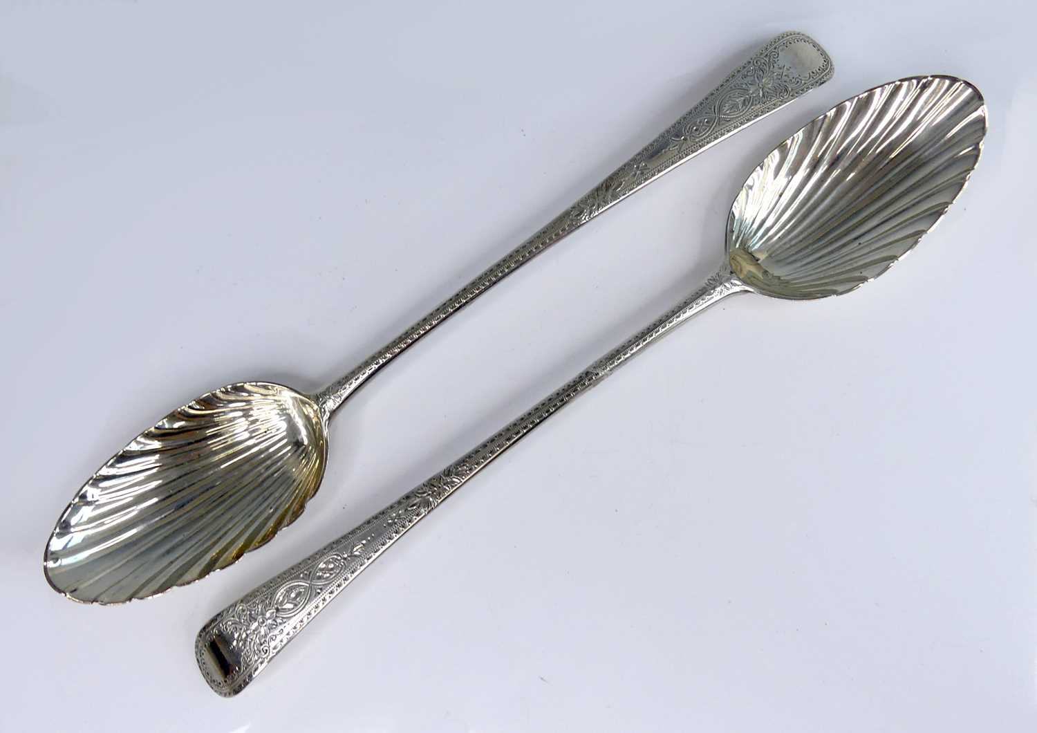 Lot 2088 - A pair of George III silver serving spoons,...