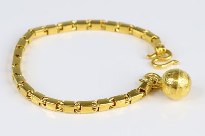 Lot 2701 - A yellow metal rectangular link bracelet,...