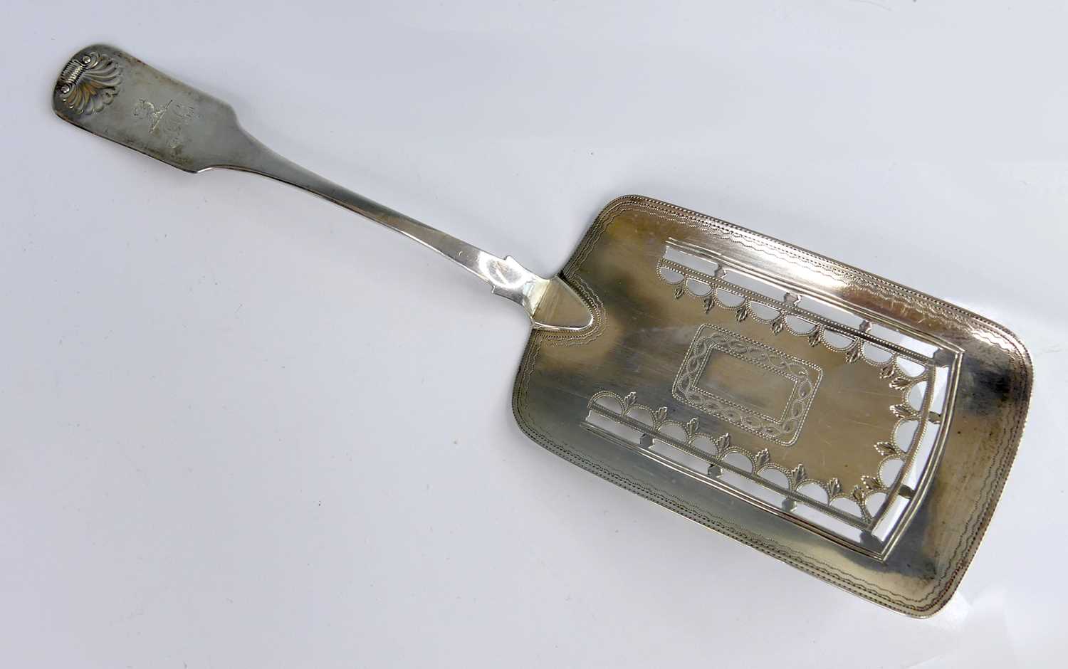 Lot 2083 - A George III Irish silver serving slice, in...