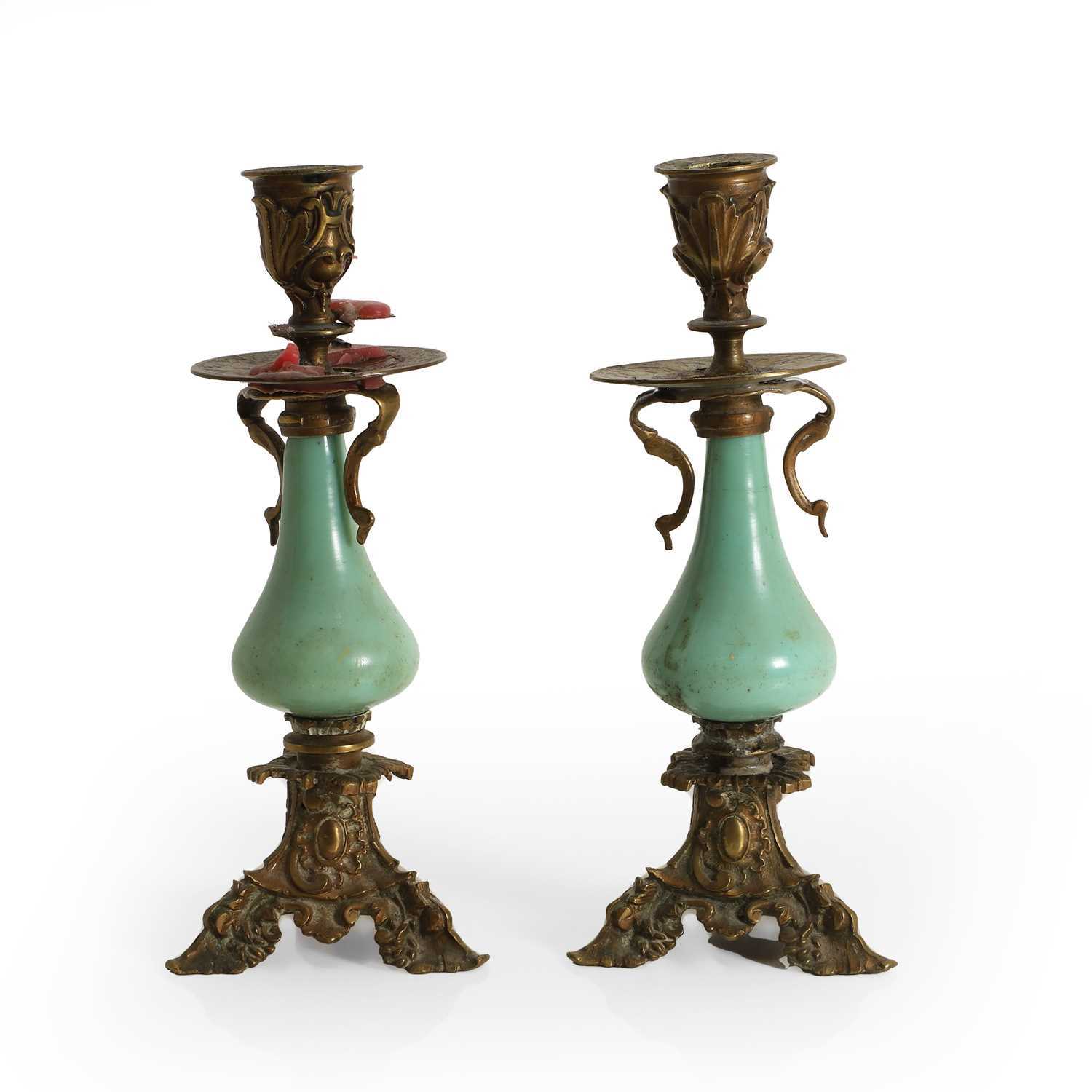Lot 184 - A pair of gilt metal and porcelain...
