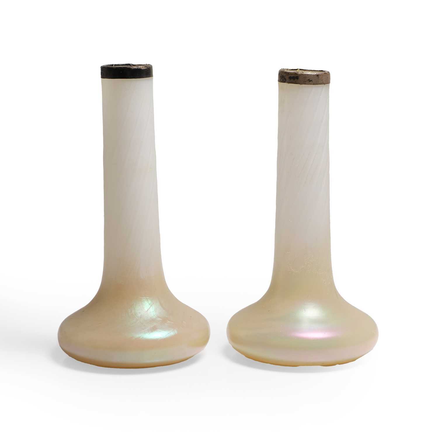 Lot 185 - A pair of iridescent vases, of bottle neck...