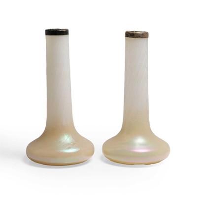 Lot 185 - A pair of iridescent vases, of bottle neck...