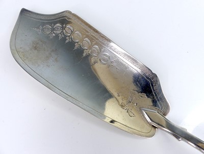 Lot 2084 - A George III silver fish slice, in the Fiddle...
