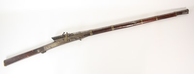 Lot 558 - A 19th century Eastern matchlock musket, the...