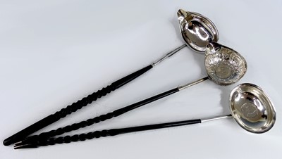 Lot 2074 - Three Georgian silver bowled and whale bone...