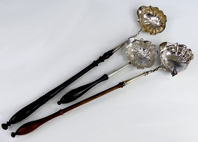 Lot 2075 - Three Georgian silver bowled and turned wooden...